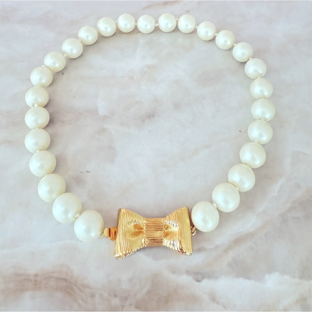 SOLD- Kate Spade All wrapped up in pearls gold necklace